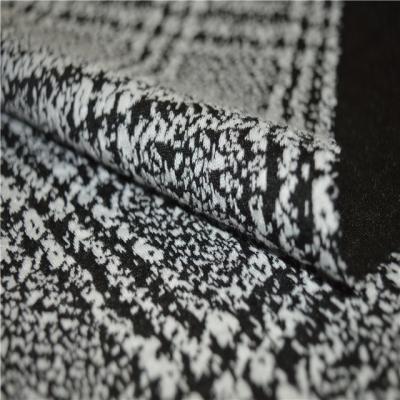 China SIZE Most Popular Yarn Dyed Black And White Polyester Spandex Jacquard Knitted Fabric for sale