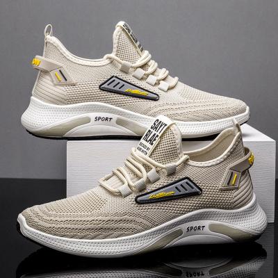 China Low wholesale price breathable knitted fashion sneakers for men lace up breathable non slip sports shoes for sale