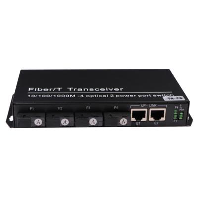 China Low Temperature Broadcast Telecom Ethernet Degree 1000M Electronic Equipment Fiber Optic Media Converter 2 Ethernet 4 Ports 3KM for sale