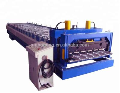 China Building Material Shops New Type Trapezoidal Roof Tile Roll Forming Machine Step Tile Forming Machine for sale