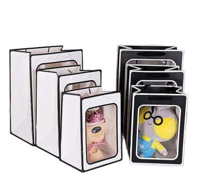 China Wholesale Custom Logo Portable Transparent Window Paper Bag Recyclable With Portable Rope for sale