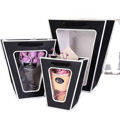 China Recyclable Stain Factory Price Kraft Paper Flower Trapezoidal Bag With Transparent PVC Window Paper Bag for sale