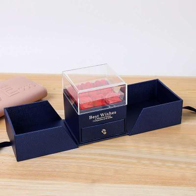 China Double opened the bolsa de joyas factory direct sales flower jewelry box double door open gift box blue eternal rose jewelry color package boxes for sale