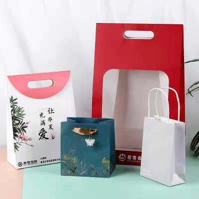 China Custom Recyclable Kraft Paper Bag With Black Handle Gift Craft Shopping Packaging Printed Flower Wine Paper Bag for sale