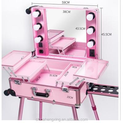 China Fashion Hengxin Brand LED Case Trolley Case Makeup Aluminum Rolling Black Cosmetic Train Case for sale