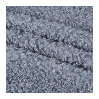 China Factory direct sale 850gsm polyester solid color teddy fleece breathable warm fabric for autumn and winter clothing for sale