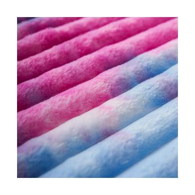 China 2022 Fashion 100% Polyester 600gsm Breathable Warm Drawn Tie Dye Printed Rabbit Fur Fleece Fabric For Winter Apparel for sale