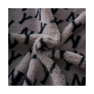 China Breathable High Quality Soft Faux Rabbit Fur Fleece Cozy Polyester Y-check Printed Fabric For Winter Coat for sale