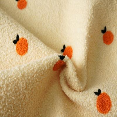 China Chinese manufacturer winter breathable warm polyester pajamas interlock bonded teddy bear fleece fabric for sale