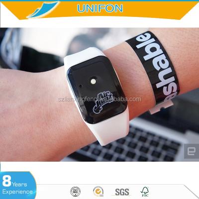 China Ticket Products 13.56MHz NFC Wristband Ticket For Music Festival Cinema Marketing for sale