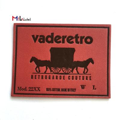 China Handmade wholesale custom genuine leather branded leather patches debossed iron on leather labels for garment shoes bags for sale