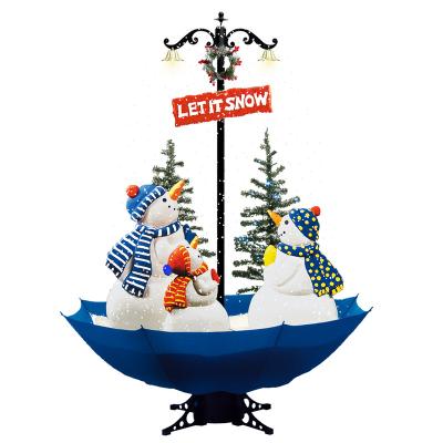 China European musical christmas decorations shopping decoration market falling snow blowing christmas tree with umbrella and penguins for sale