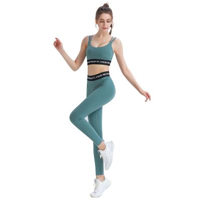 China New Breathable Yoga Fitness Suit Black Female Yoga Suit Polyester And Spandex Yoga Suit for sale