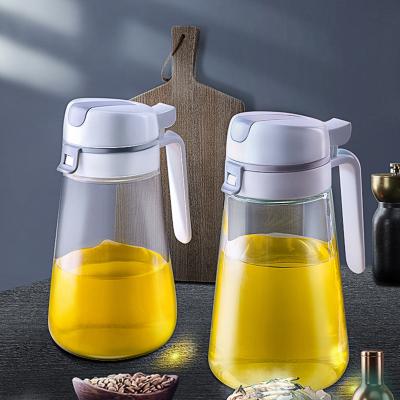 China PP Kitchen Organizer Sustainable Plastic Cooking Vegetable Olive Oil Glass Jar Vinegar Bottle Automatic Oil Dispenser for sale