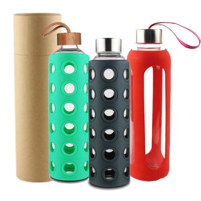 China 750ml 550ml Borosilicate Glass BPA Free Viable Water Bottle With Custom Logo, Sports Drinking Bottle Glass With Bamboo Lid Wholesale for sale