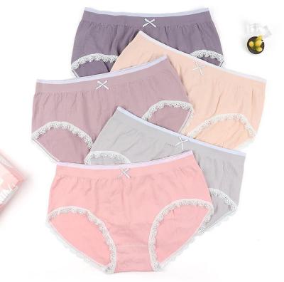 China Crtoch Antibacterial Seamless Nude Cheekies Cotton Underwear Female Ammonia Briefs Lace Up Bow Flame Bird Women Stretch Panties for sale