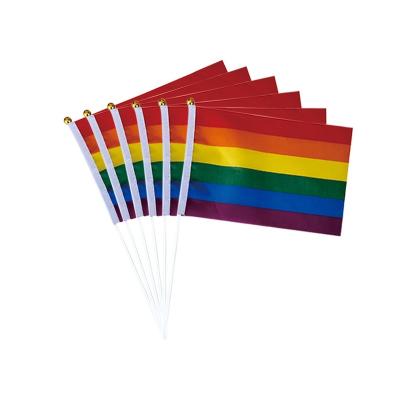 China Factory direct sales environmental friendly and durable polyester small hand waving national flag rainbow hand waving hand flag for sale