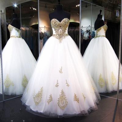 China 2019 Breathable New Hand Design Crystal Beads Ball Gown Gold Lace Applique Wedding Dress for sale