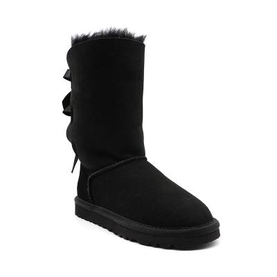 China Wholesale Fashion Trend Ladies Sheepskin Children Women Snow Boots With Ribbon Fur Snow Boots With Bows for sale