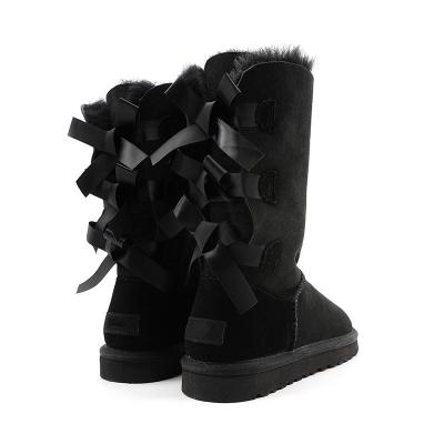 China Fashion Trend Ladies Sheepskin Children Women Snow Boots With Ribbon Fur Snow Boots With Bows Winter Snow Boots for sale