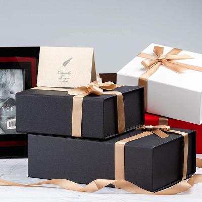 China Recycled Materials Wholesale Custom Luxury Black Gift Packing Box Collapsible Magnetic Closure Gift Box With Ribbon for sale