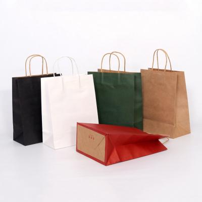 China Recycled materials wholesale custom eco-friendly high quality shopping bag logo shopping paper shopping bag with handles for sale