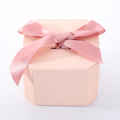 China Recycled Materials Wholesale Custom Pink Bow Gift Box Perfume Packaging Box With Ribbon for sale