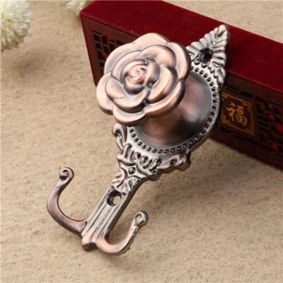 China Xusheng Curtain Accessories Rose Zinc Alloy Curtain Hook for sale