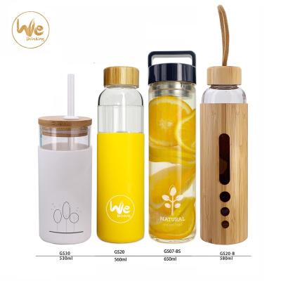 China Sustainable Single Wall Borosilicate Glass Water Bottle With Bamboo Lid For Promotion for sale