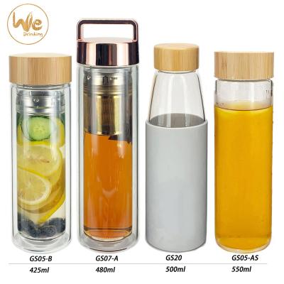 China 100% BPA Borosilicate Viable Free Wall Double Wall Glass Tea Infuser Bottle With Natural Bamboo Lid for sale