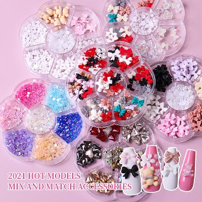 China Various Styles Wholesale 7 Grids 3D Cartoon Bowknot DIY Nails Pattern Charms For Nail Art Decoration for sale