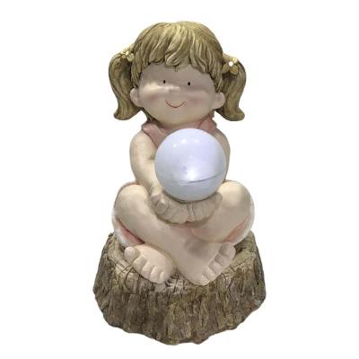 China Handmade Wholesale Cute Home Decoration Garden Statue With Boy Girl Solar Light Ornament for sale