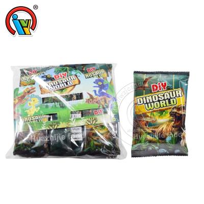 China Plastic DIY Dinosaur Toy Candy Toy Candy For Kids T750 for sale