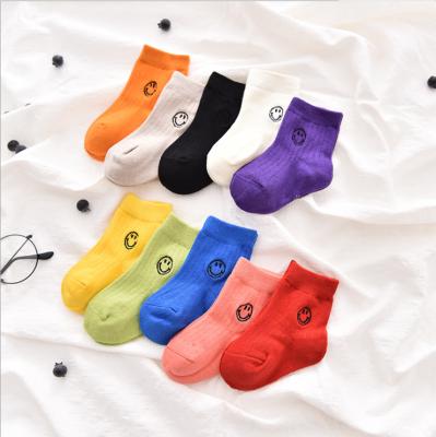 China New Product QUICK DRY QUICK DRY Children's HRUN Socks Pure Color Embroidery Smile Children's Socks for sale