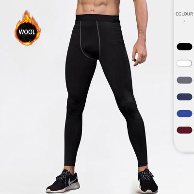 China High Quality Winter Men's Breathable Gym Pants Sports Yoga Fitness Quicy Wool Dry Breathable Winter Warm Plus Size Tights Jogging Gaiters for sale