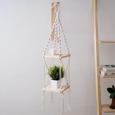 China Fashion Style Macrame 2 Tiers Traditional Bohemian Handmade Wall Hanging Floating Shelf For Living Room for sale