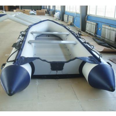 China Freshwater Fishing 2.9m Plywood Floor Inflatable Boat Heavy Duty Inflatable Boat 4 Person PVC Fabric Inflatable Boat for sale