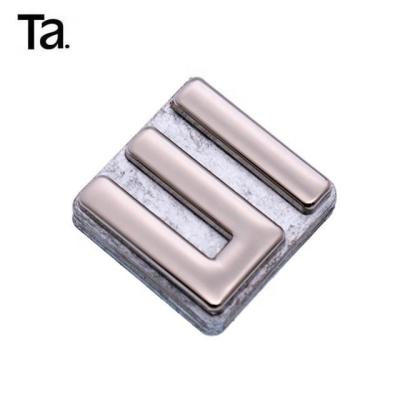 China TANAI Eco-friendly custom high quality private handbag metal brand logo letters brand metal logo for bags for sale