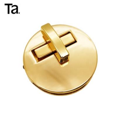 Cina TANAI Eco-friendly Wholesale Metal Twist Locks Custom Design Press Handbag Lock Hardware For Bags in vendita