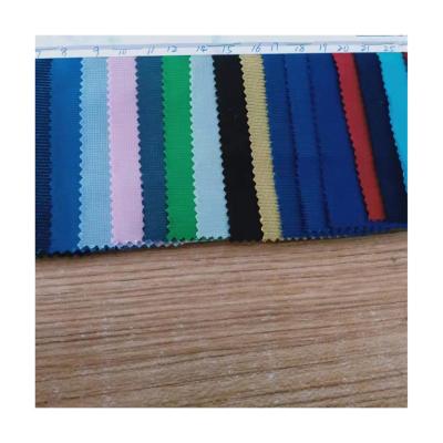 China Bright Plain 100% Polyester Shrink-Resistant Fabric For Garment for sale