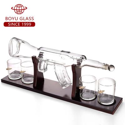 China Sustainable Hot Selling Globe Decanter Glass Mouth AK 47 Blown Gun Shape Decanters Whiskey for sale