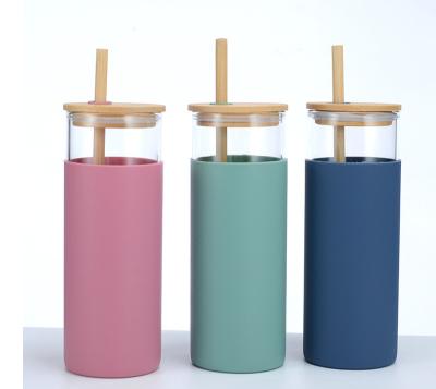 China Sustainable Bamboo Sleeve Lid Silicon Crystal Water Bottle With Silicon Drinking Straw for sale