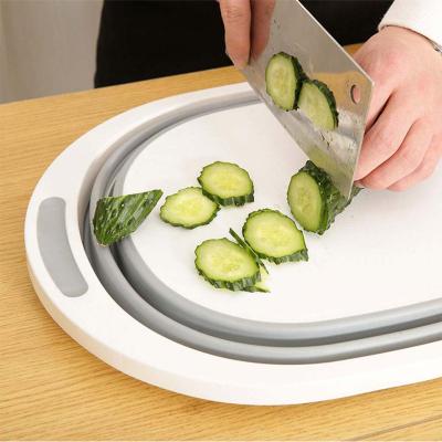 China Sustainable Multifunctional Folding Cutting Board Silicone Vegetable Basket For Kitchen for sale