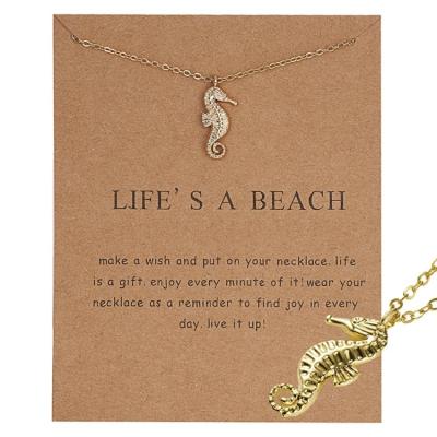 China ZHIYI Girls Environmental Friendly Women Shape Gold Plated Smiling Stick Face Snowflake Seahorse Pendant Make Wish Card Necklace For Gift for sale