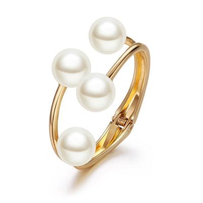 China Wholesale Environmental Friendly Fashion Ladies Girls Charm Big Pearl Gold Plated Exaggerate Hawaiian Open Cuff Bracelet For Women for sale