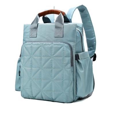 China Anti-theft Adult Best Handle Leather Backpack Stitched Baby Diaper Bag Mommy Changing Bag for sale