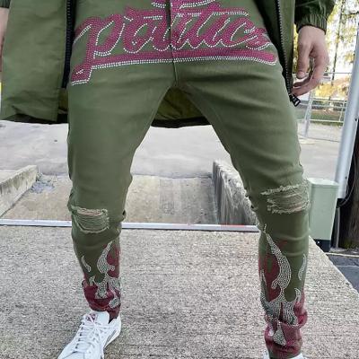 China Breathable Custom Designer Acid Wash Flare Stacked Jeans Pants Fit Ripped Distressed Rhinestone Jeans Men for sale