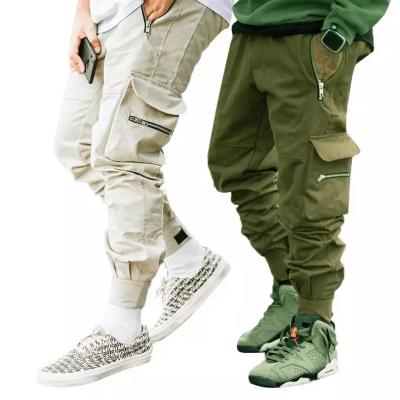 China Anti-wrinkle High Street Causal Cargo Pants Custom Logo Private Label Jogging Zipper Pockets Cargo Pants Men for sale