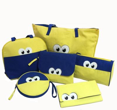 China Wholesale Custom Fashion Yellow Blue Cute Animated Logo Emoticons Eye Cartoon Pattern Zipper Canvas Makeup Bag for sale