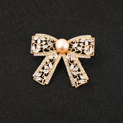 China Fashionable elegant women bow pin brooches pin brooches channel brooch pin brooches women for sale